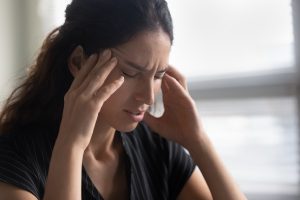 Meditation sickness-young woman looking stressed