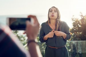 Inner child-woman sticking tongue out at camera